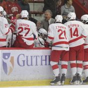 Coach Schafer making a point on the bench