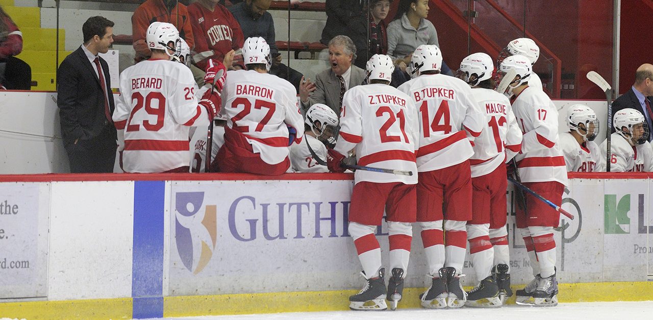 Coach Schafer making a point on the bench